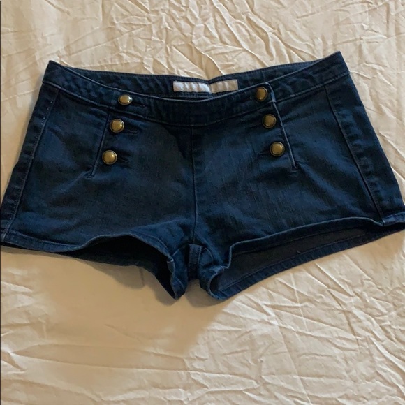 Dark blue pull on jean shorts with button accents - Picture 1 of 3